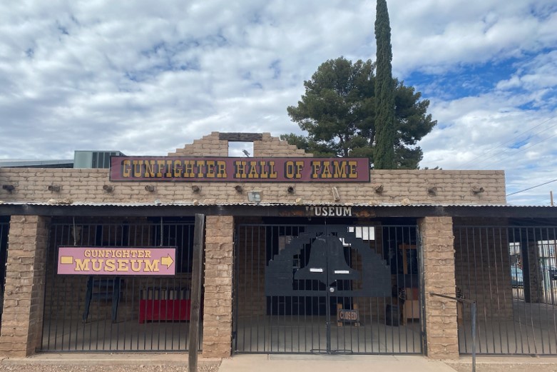 A building with a sign reading Gunfighter Hall of Fame.